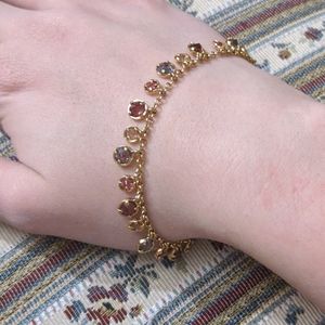 Dainty bracelet with pink and purple crystals